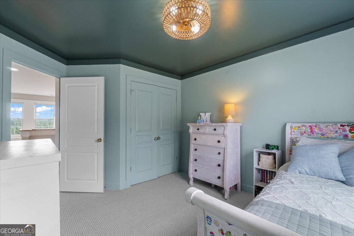 1670 Price Mill Road Bishop, GA 30621 - Photo 43 of 53 a view of a bedroom with baby toys