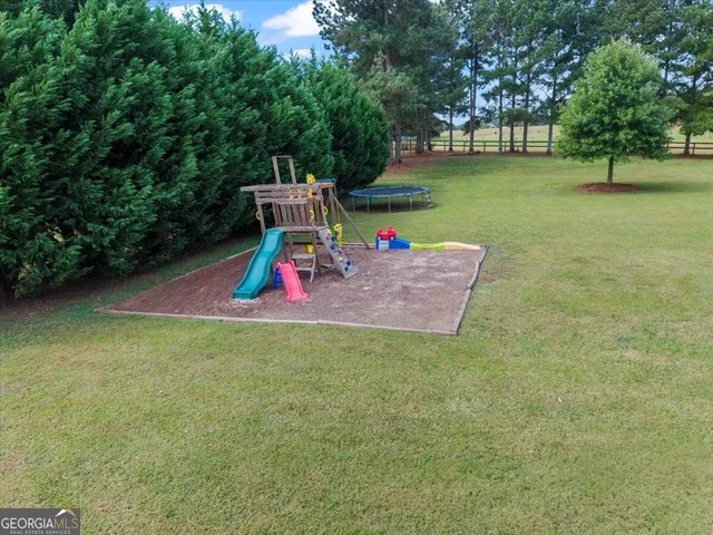 a view of a park with slide