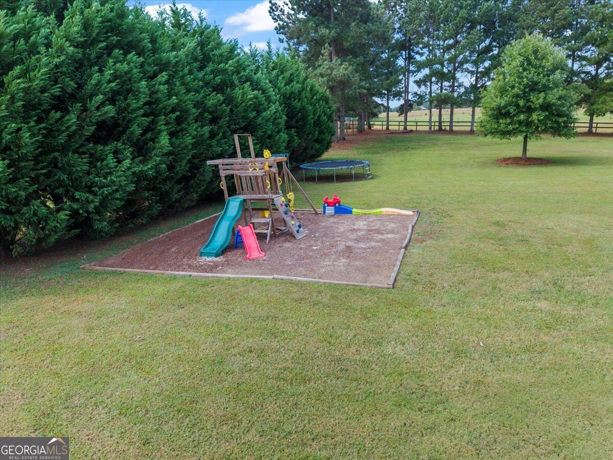 1670 Price Mill Road Bishop, GA 30621 - Photo 9 of 53 a view of a park with slide