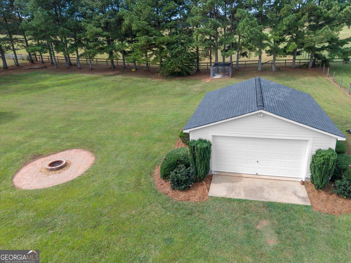 1670 Price Mill Road Bishop, GA 30621 - Photo 10 of 53 a front view of a house with a yard