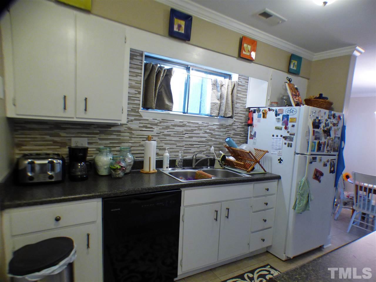 5923 Farm Gate Road Raleigh, NC 27606 - Photo 7 of 18