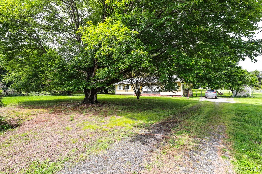 8229 Little Florida Road Mechanicsville, VA 23111 - Photo 12 of 40 View of yard featuring driveway