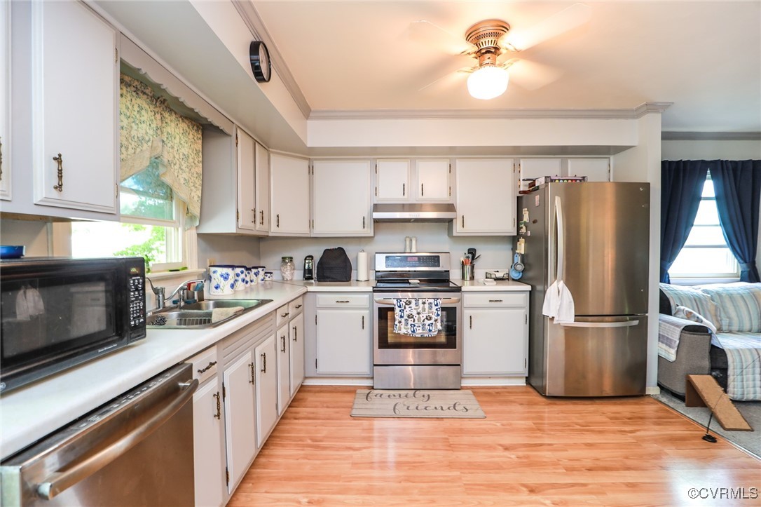 8229 Little Florida Road Mechanicsville, VA 23111 - Photo 29 of 40 Kitchen with a sink, stainless steel appliances, u