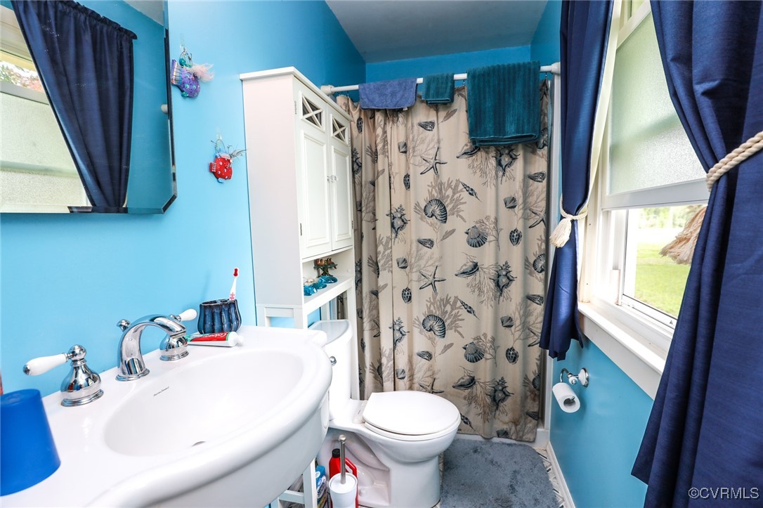 8229 Little Florida Road Mechanicsville, VA 23111 - Photo 40 of 40 Full bath featuring toilet, a sink, and a shower w