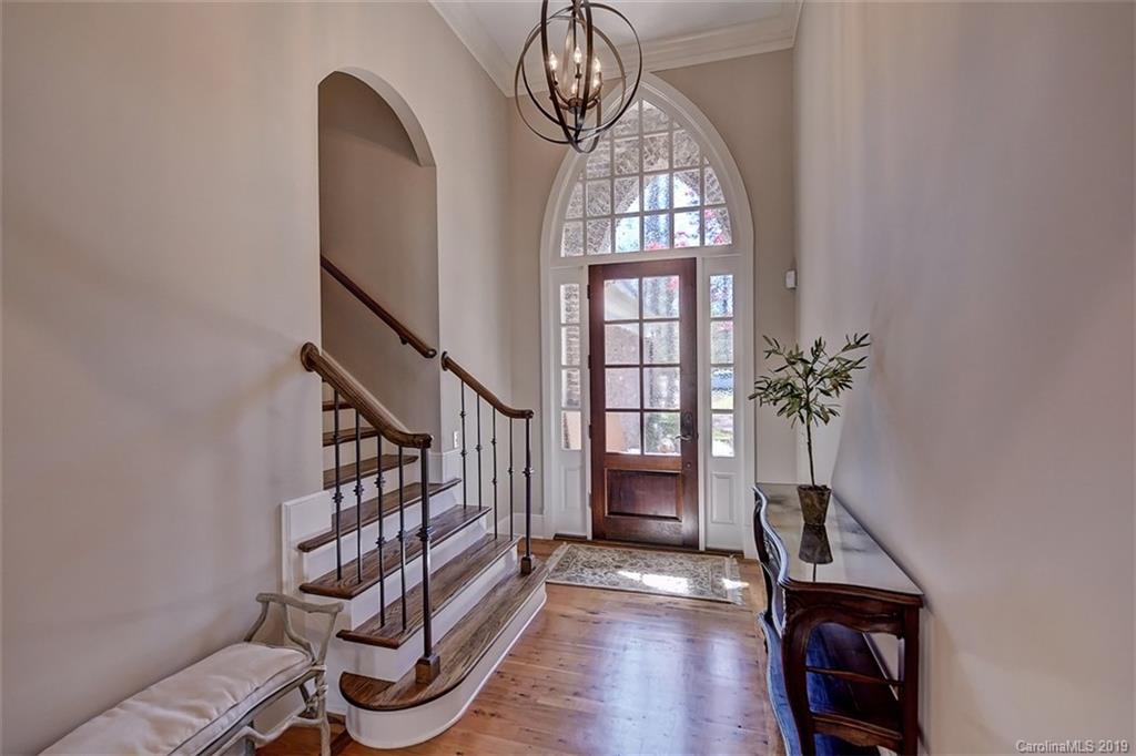 146 Dedham Loop Mooresville, NC 28117 - Photo 2 of 29 a view of an entryway with wooden floor