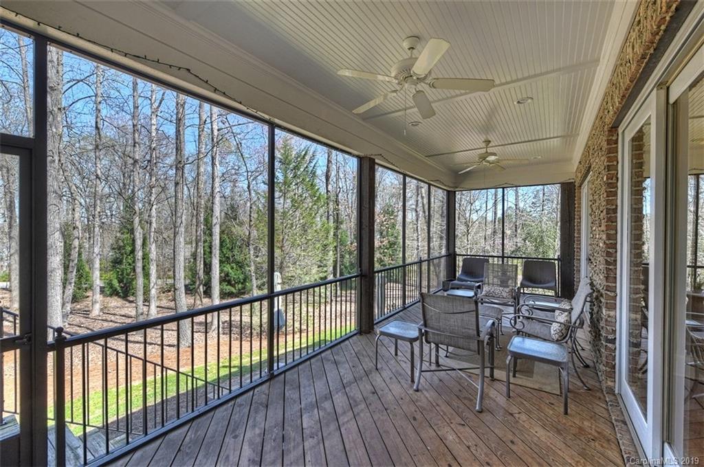 146 Dedham Loop Mooresville, NC 28117 - Photo 13 of 29 a view of a porch with furniture and wooden floor