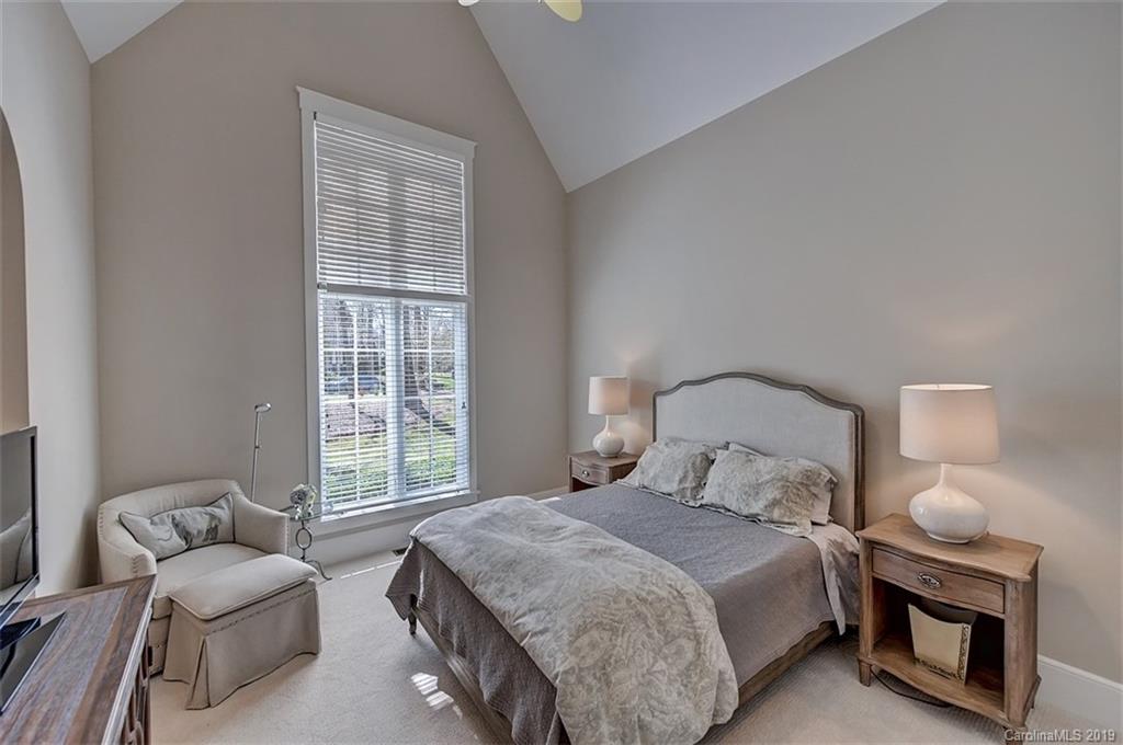 146 Dedham Loop Mooresville, NC 28117 - Photo 20 of 29 a bedroom with a bed and a couch