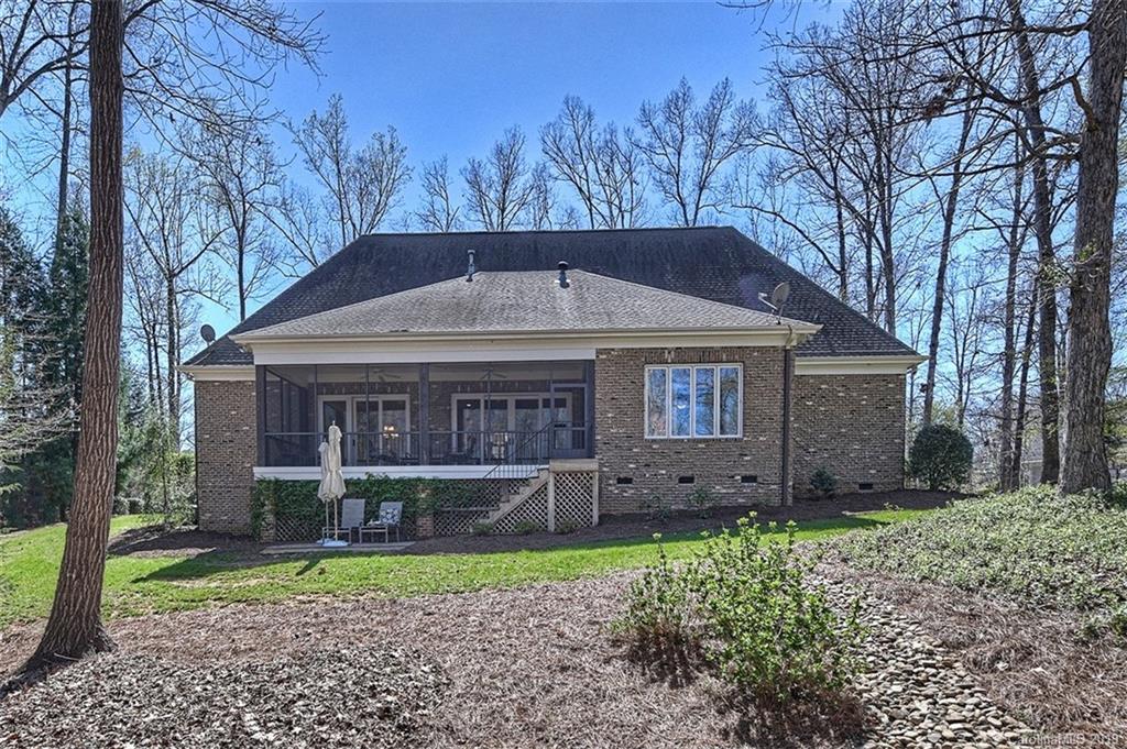 146 Dedham Loop Mooresville, NC 28117 - Photo 27 of 29 a front view of a house with garden