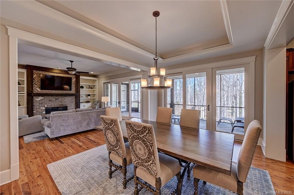 146 Dedham Loop Mooresville, NC 28117 - Photo 6 of 29 a view of a dining room with furniture window and wooden floor