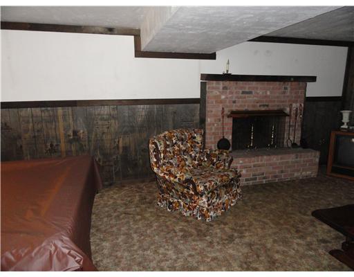 1624 Wilson Road Pittsburgh, PA 15236 - Photo 13 of 18 Family Room. Fireplace features gas logs.