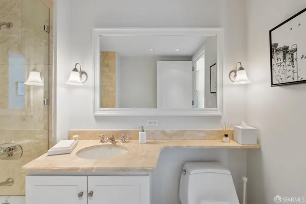 a bathroom with a sink and a mirror