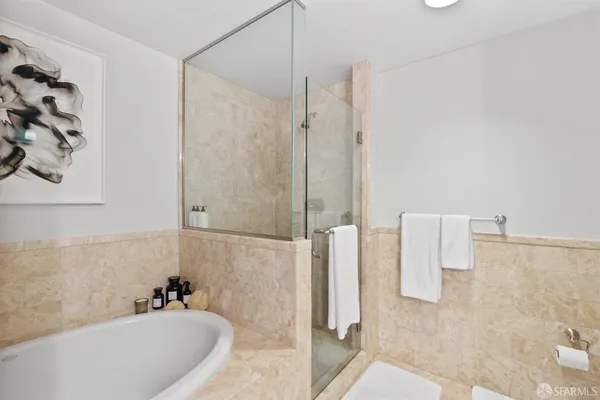 a bathroom with a double vanity sink mirror and double