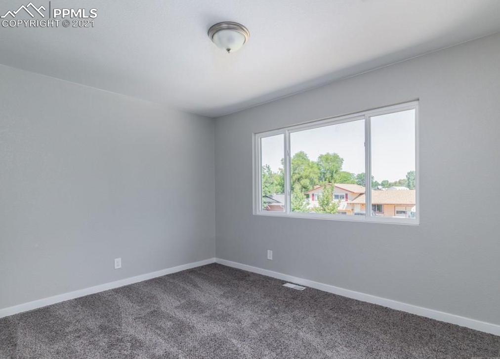 60 Calhoun Road Pueblo, CO 81001 - Photo 15 of 32 an empty room with a window