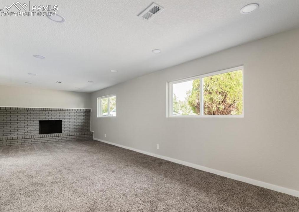 60 Calhoun Road Pueblo, CO 81001 - Photo 18 of 32 an empty room with windows
