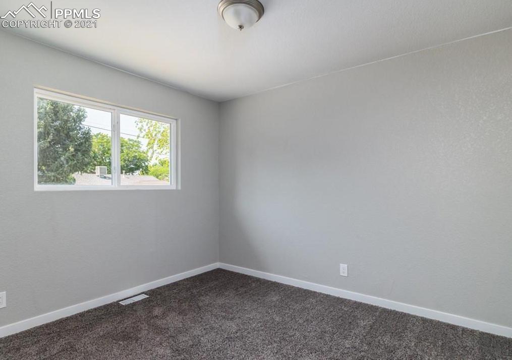 60 Calhoun Road Pueblo, CO 81001 - Photo 21 of 32 an empty room with a window