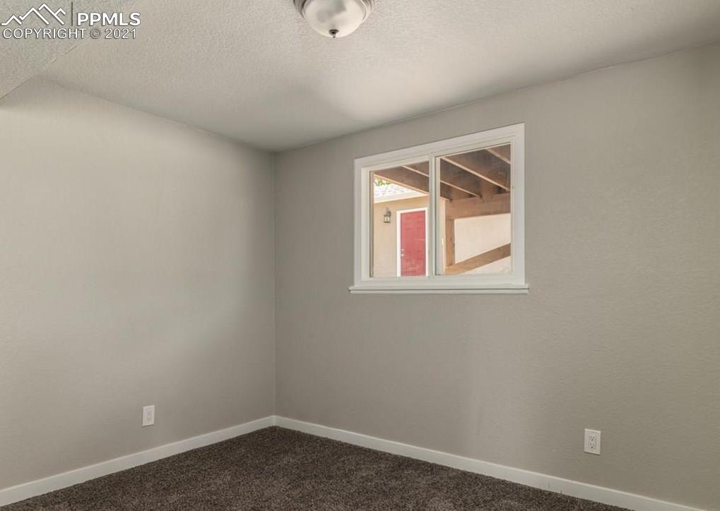60 Calhoun Road Pueblo, CO 81001 - Photo 25 of 32 an empty room with a window