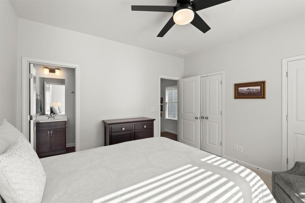 760 Aerial Way Atlanta, GA 30312 - Photo 25 of 33 a bedroom with a bed and wooden floor