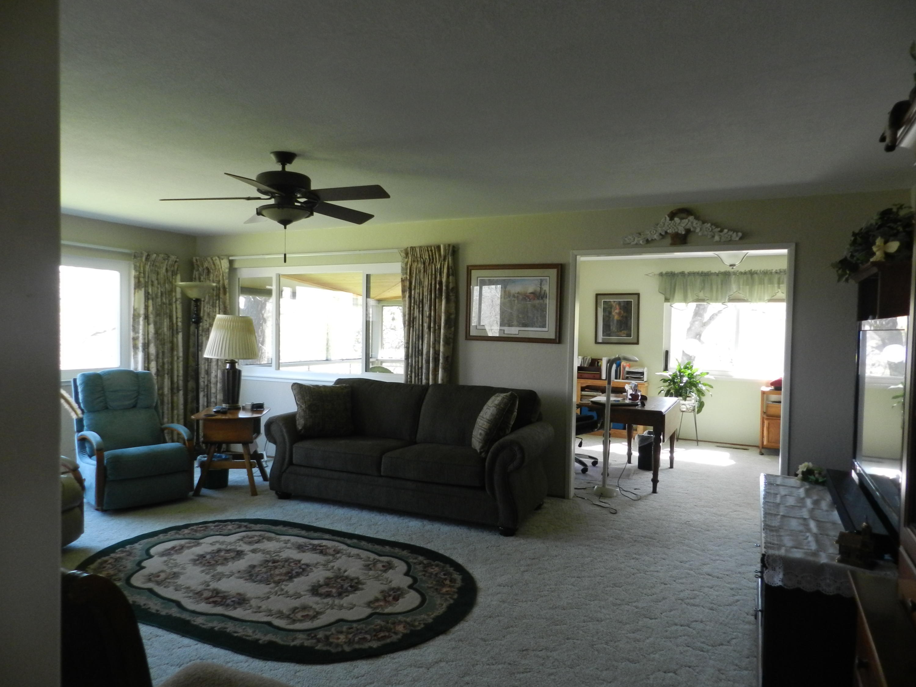8760 Valley View Road Redding, CA 96001 - Photo 7 of 42 a living room with furniture and a large window