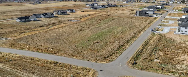 a view of a balcony with an ocean