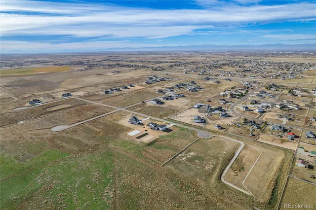 an aerial view of beach and ocean