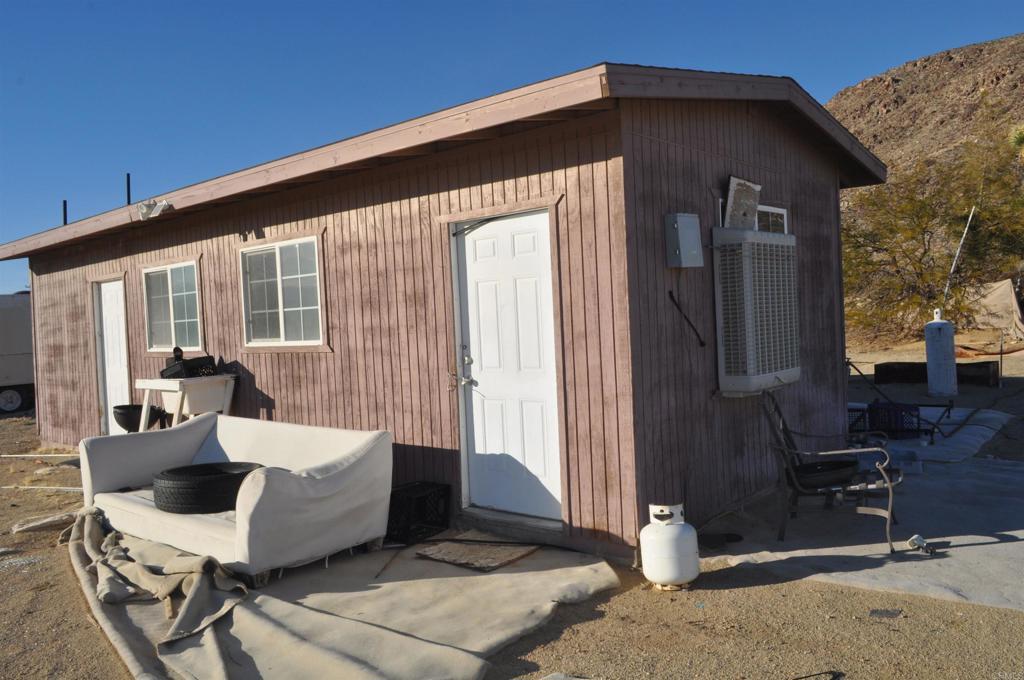59175 Rocky Acres Road Landers, CA 92285 - Photo 2 of 5 a front view of a house