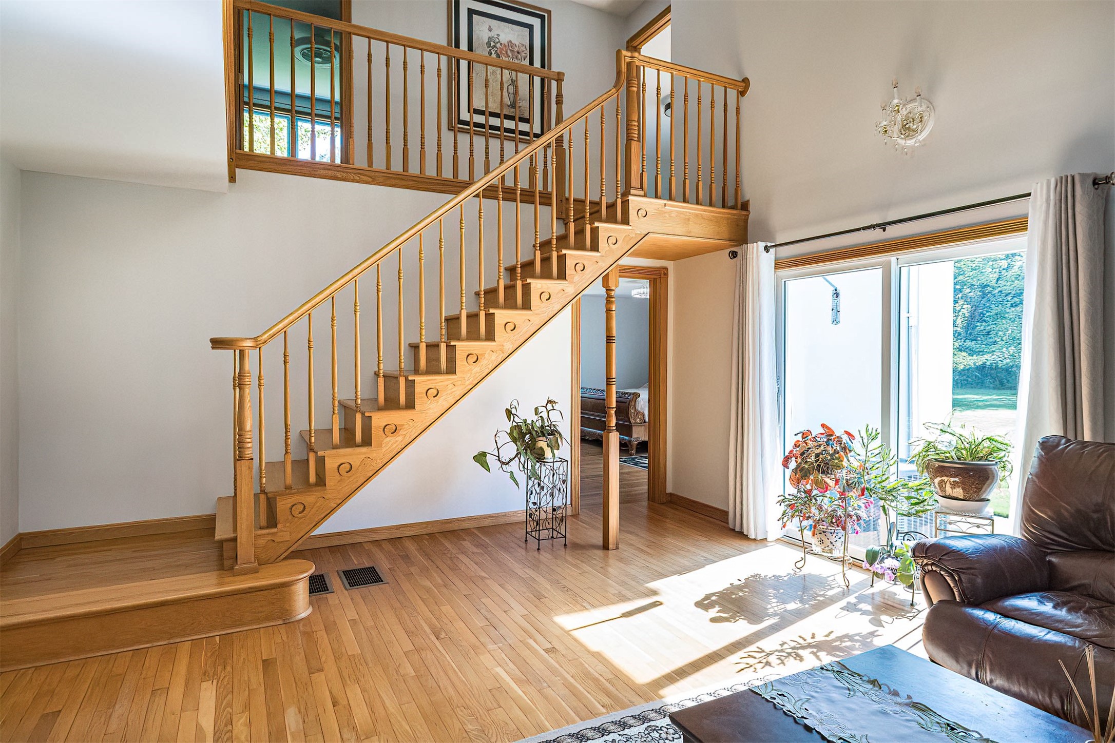 9941 Donation Road Waterford, PA 16441 - Photo 23 of 46 Beautiful wooden staircase, Sliding door leads to a patio