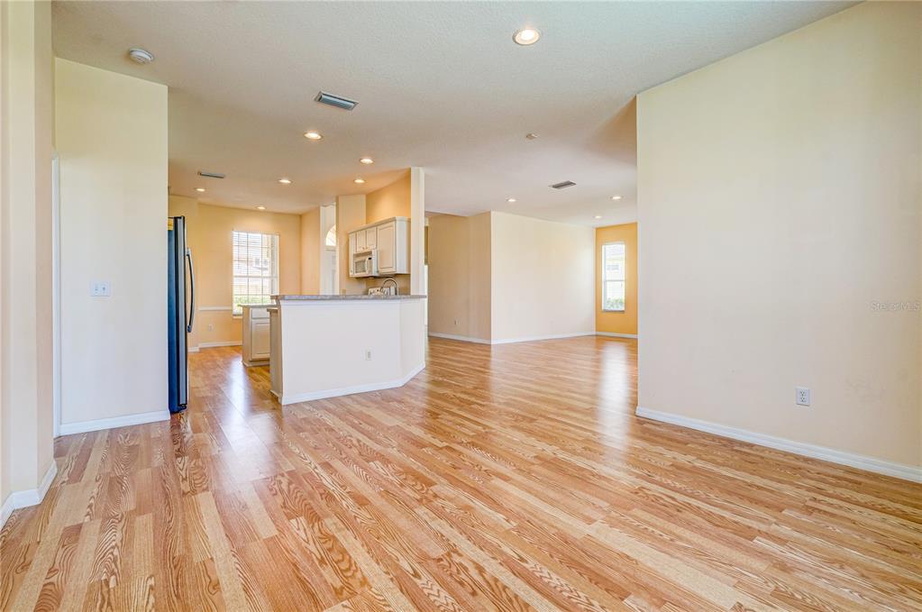 5621 52nd Avenue West Bradenton, FL 34210 - Photo 11 of 33 a view of a kitchen with wooden floor
