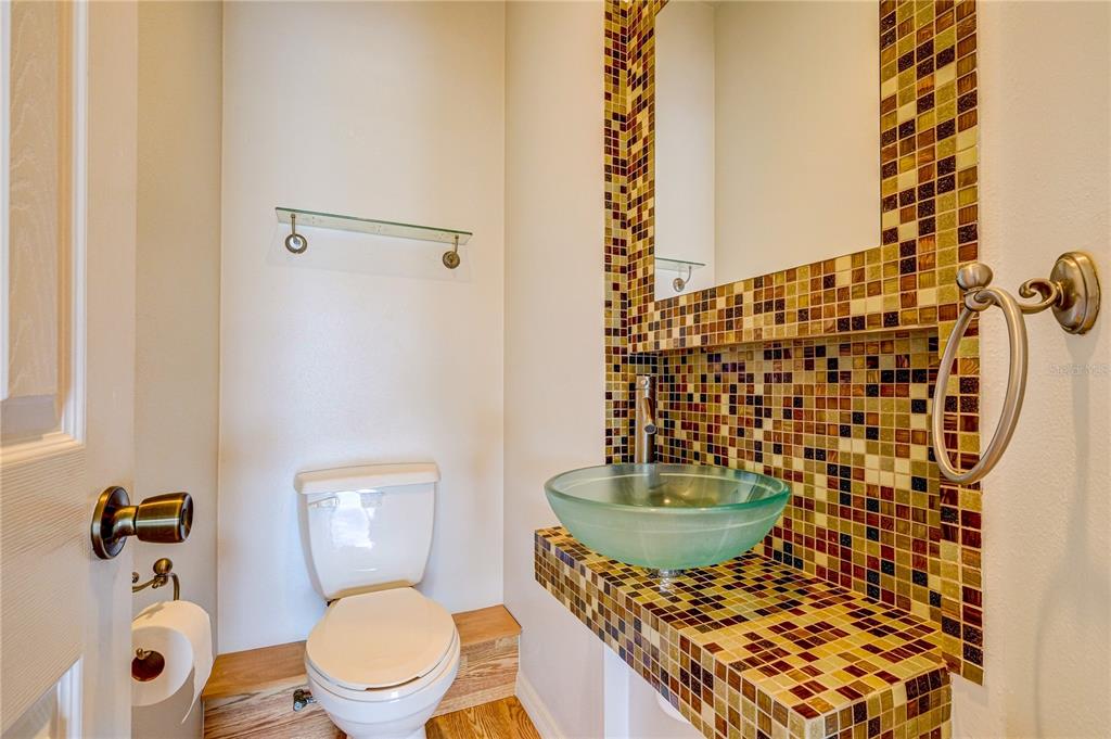 5621 52nd Avenue West Bradenton, FL 34210 - Photo 22 of 33 a bathroom with a toilet a sink and shower