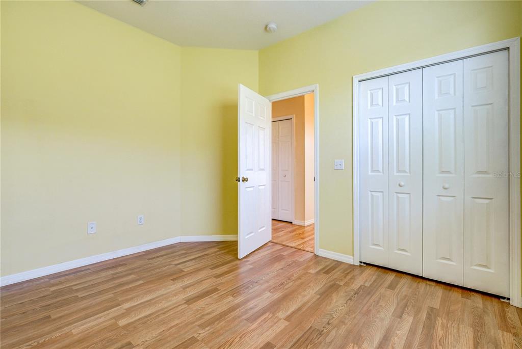 5621 52nd Avenue West Bradenton, FL 34210 - Photo 24 of 33 a view of an empty room with wooden floor