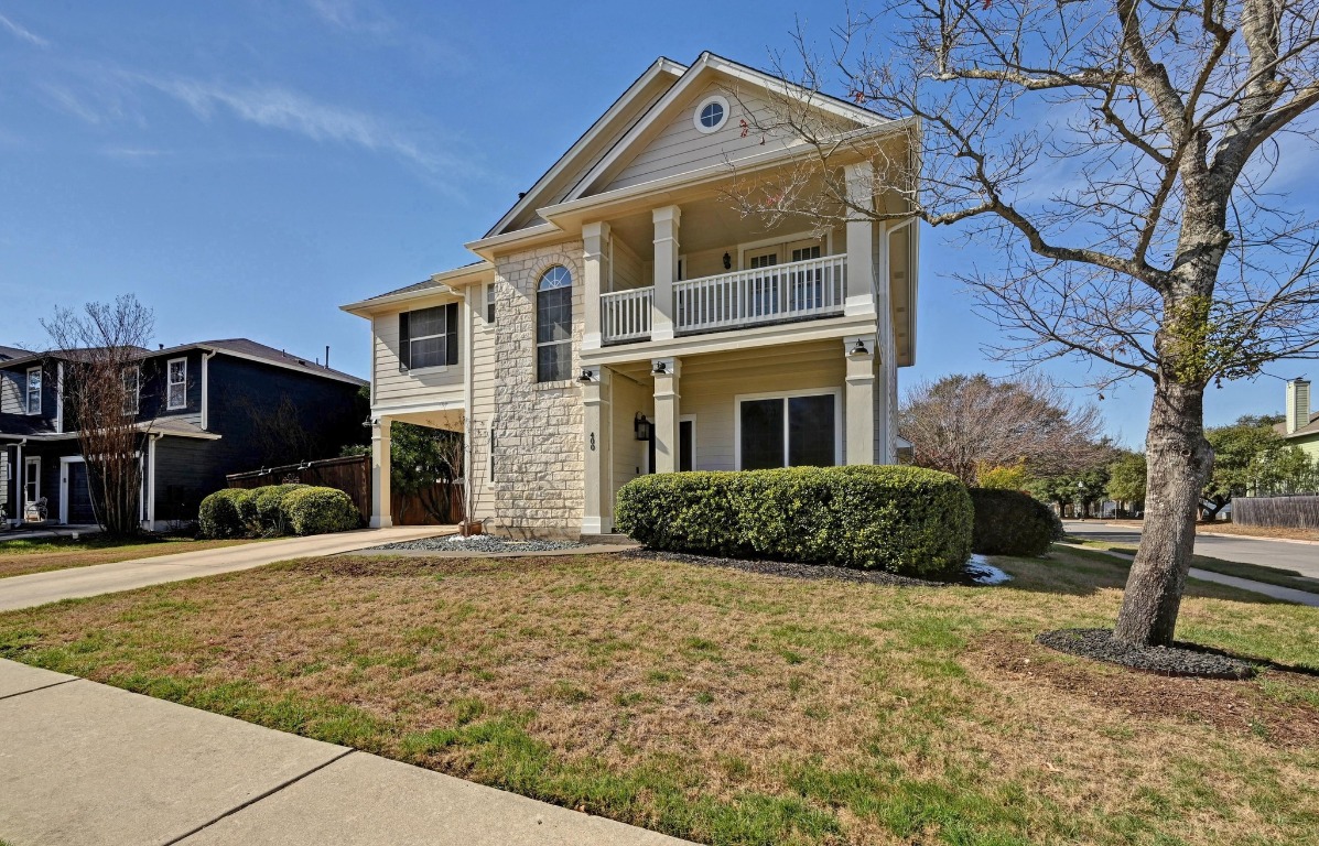 400 Tobin Drive Buda, TX 78610 - Photo 2 of 40 View of front of house with concrete driveway, covered porch, and a carport