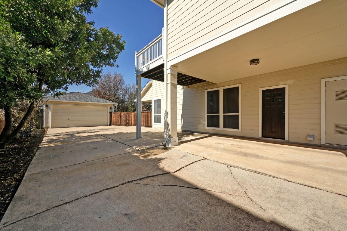 400 Tobin Drive Buda, TX 78610 - Photo 4 of 40 Patio / terrace featuring a detached garage with epoxy floors inside