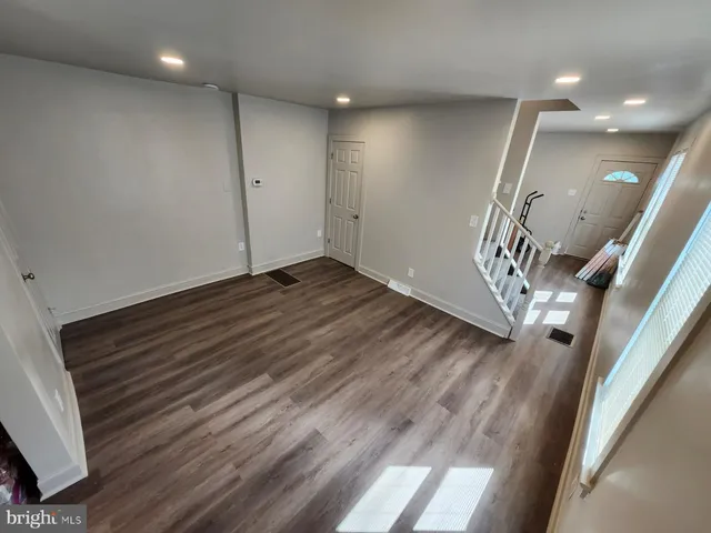 an empty room with windows