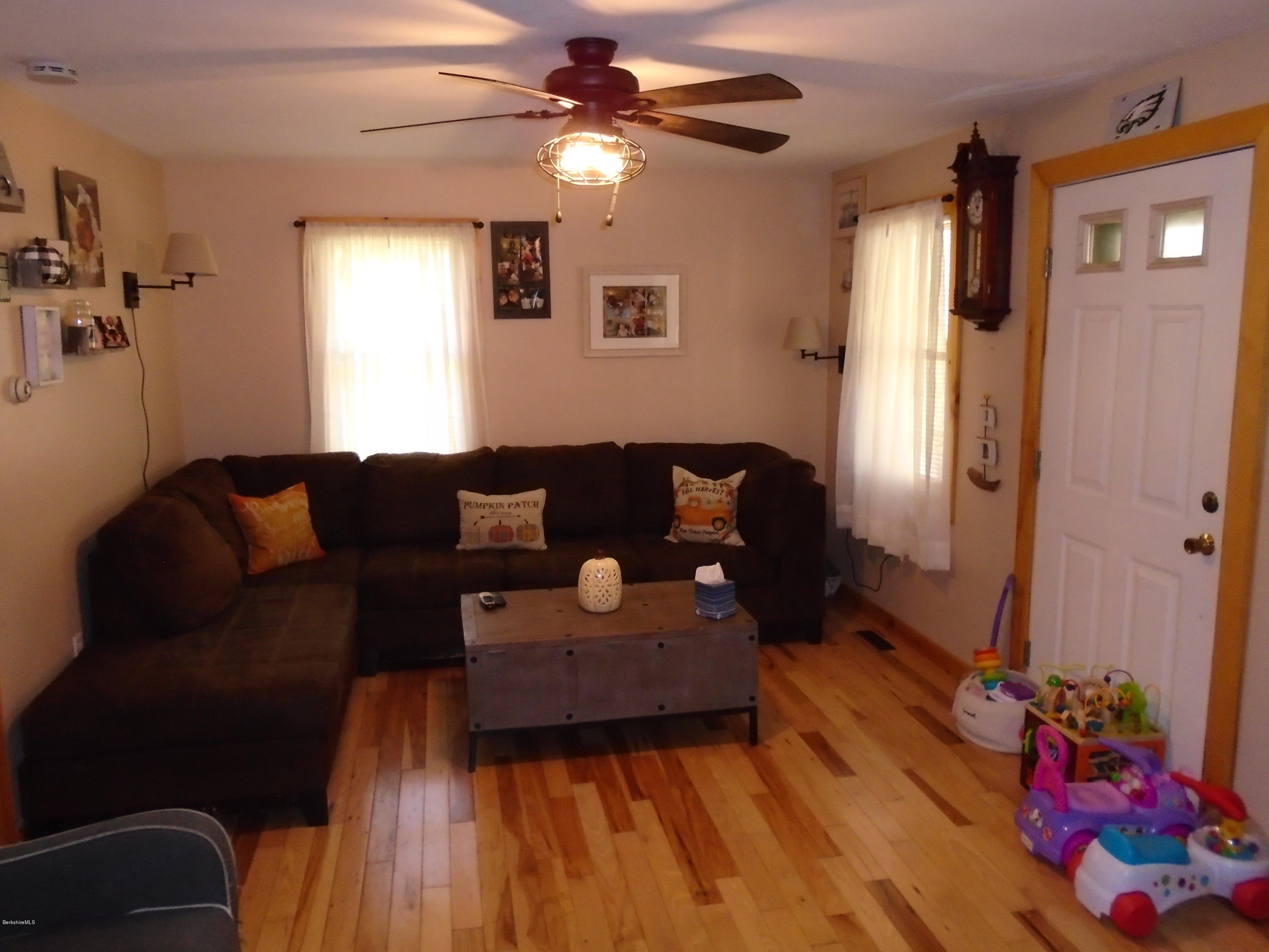 4 River Road Savoy, MA 01256 - Photo 15 of 39 a living room with furniture and a window