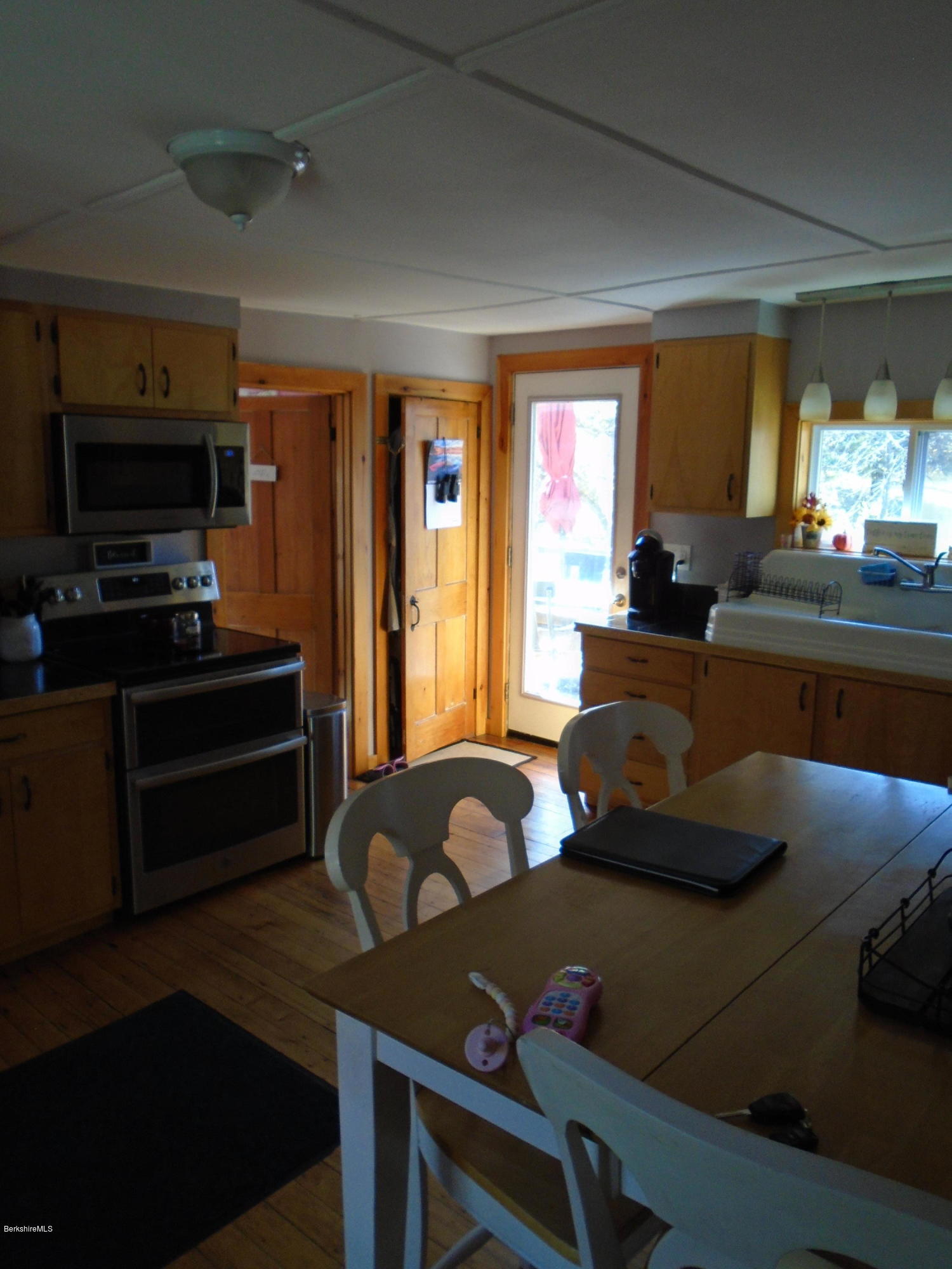 4 River Road Savoy, MA 01256 - Photo 20 of 39 a living room with furniture and a flat screen tv