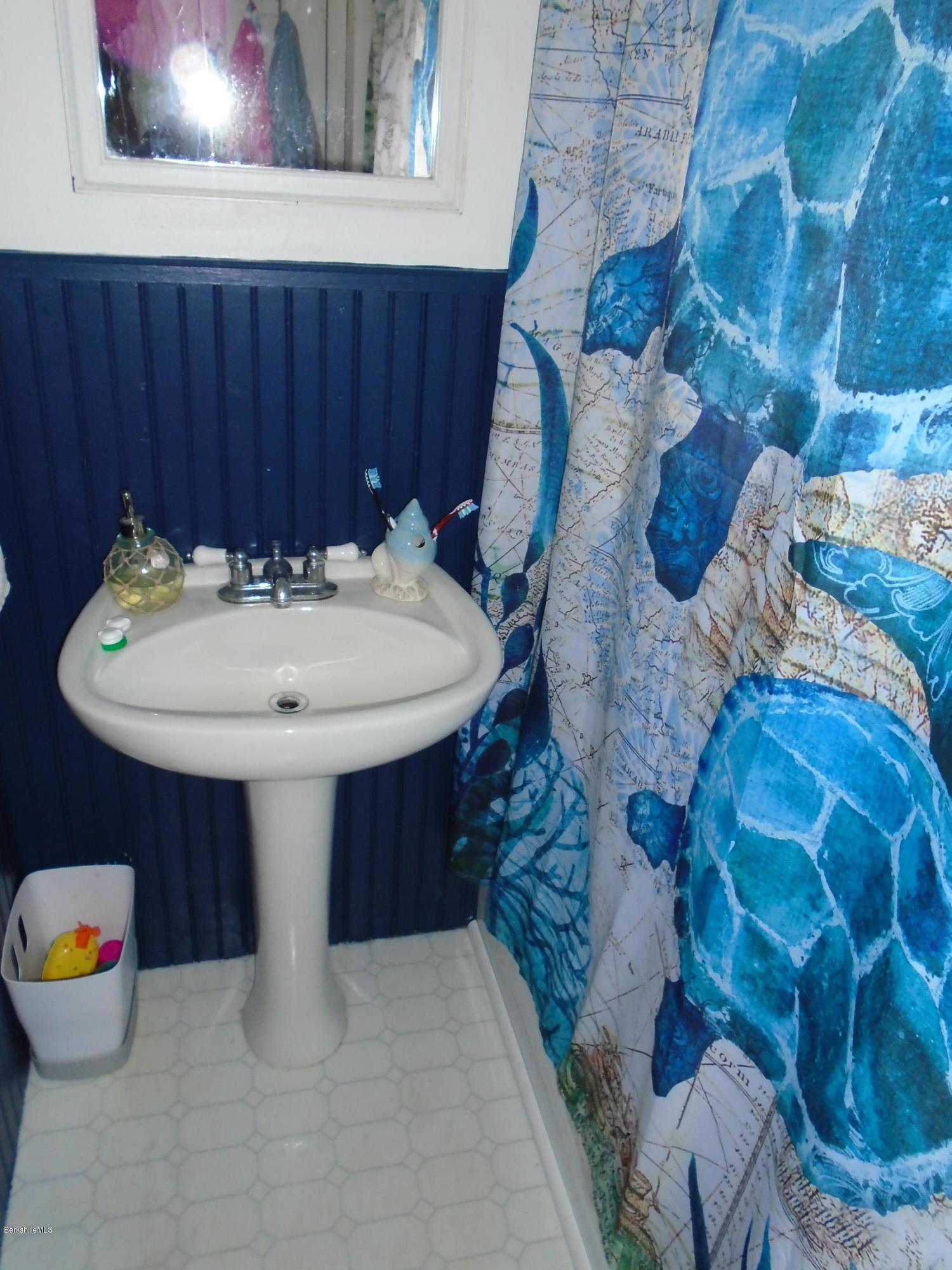 4 River Road Savoy, MA 01256 - Photo 23 of 39 a bathroom with a sink and a mirror