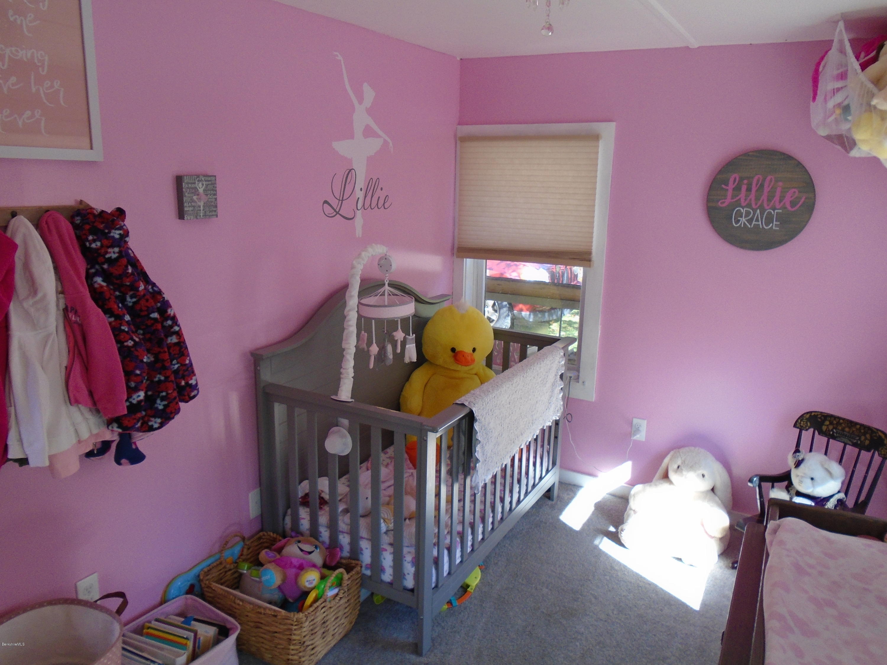 4 River Road Savoy, MA 01256 - Photo 27 of 39 a bedroom with pink walls and stairs
