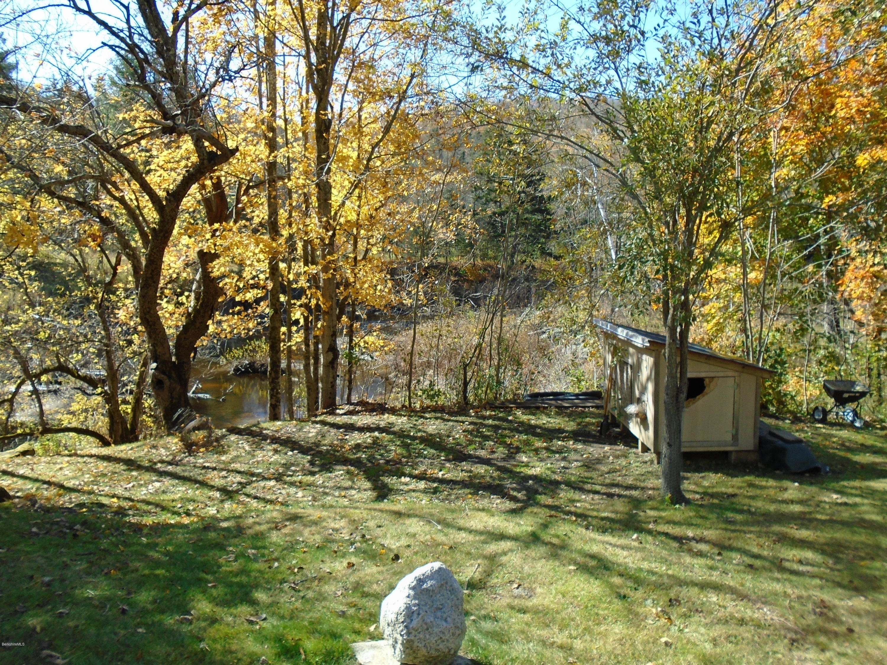 4 River Road Savoy, MA 01256 - Photo 4 of 39 a backyard of a house with lots of green space