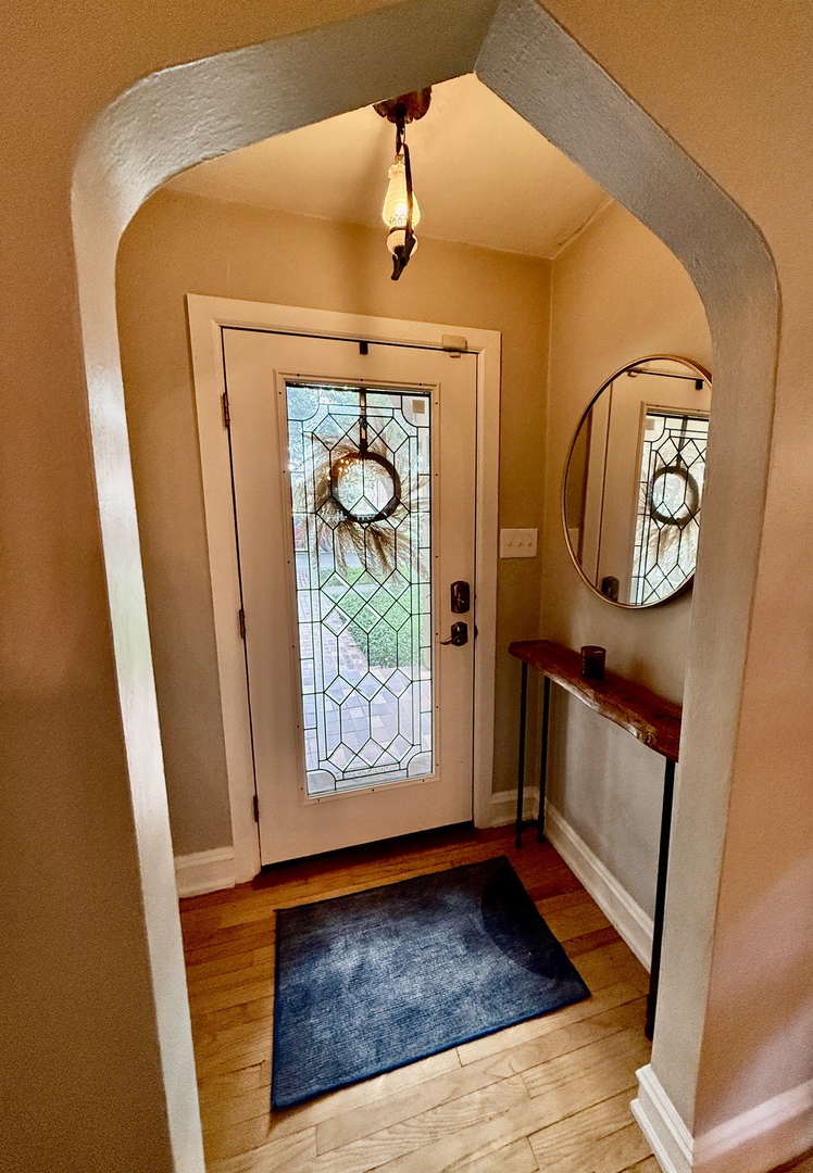 720 South New Street Champaign, IL 61820 - Photo 2 of 73 a view of an entryway door with wooden floor
