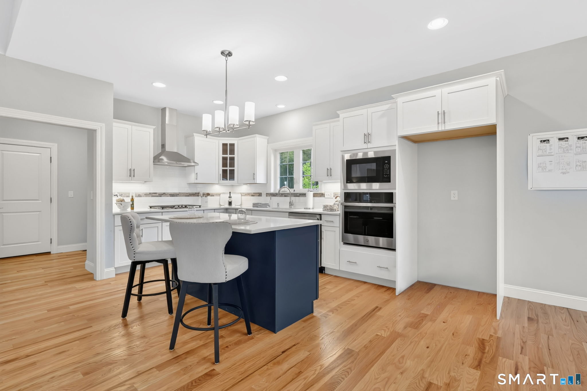 60 Liberty Lane Enfield, CT 06082 - Photo 15 of 38 a kitchen with stainless steel appliances granite countertop a stove refrigerator and a oven