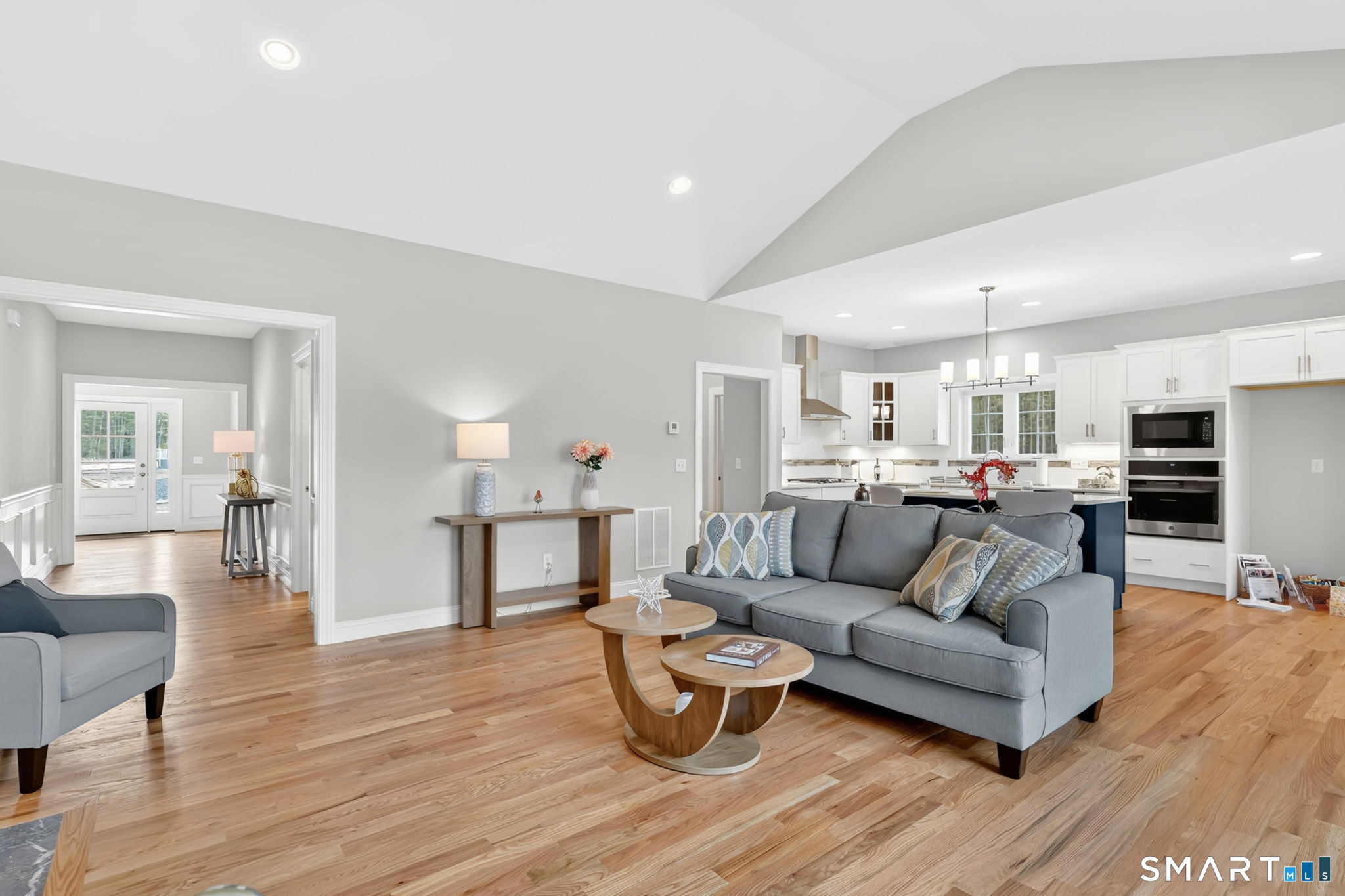 60 Liberty Lane Enfield, CT 06082 - Photo 22 of 38 a living room with furniture and a wooden floor