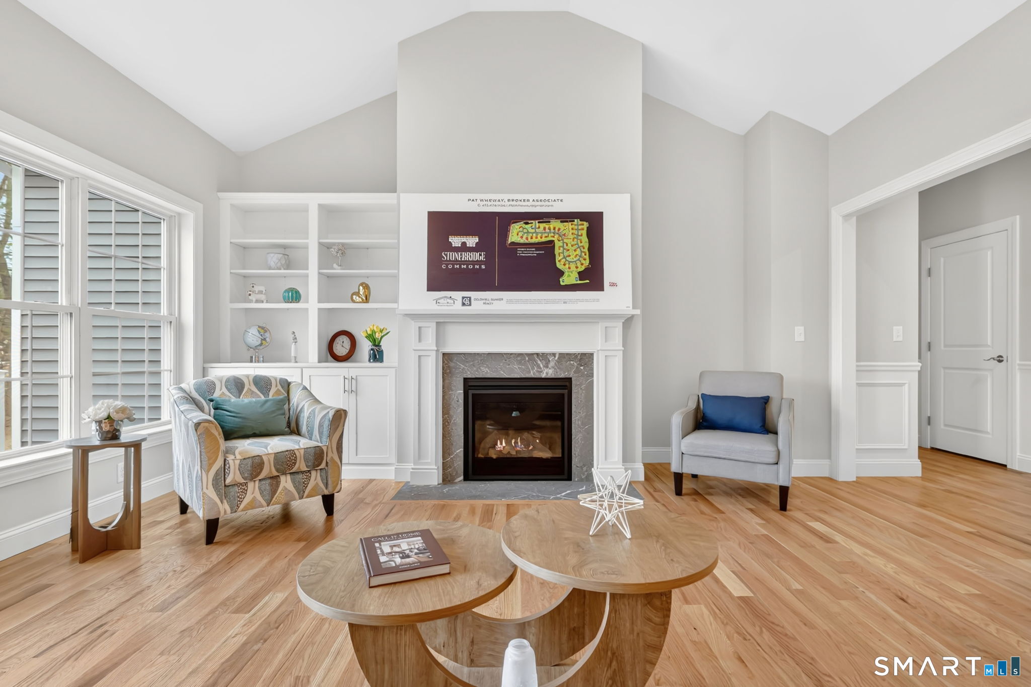 60 Liberty Lane Enfield, CT 06082 - Photo 24 of 38 a living room with furniture and a fireplace