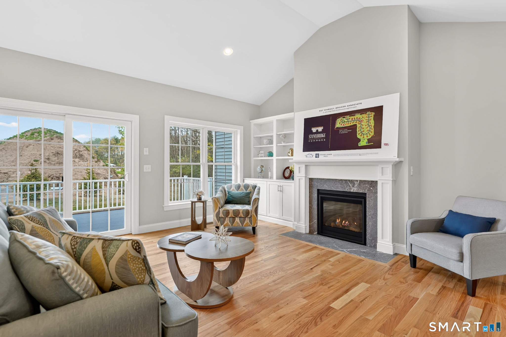 60 Liberty Lane Enfield, CT 06082 - Photo 25 of 38 a living room with furniture and a fireplace