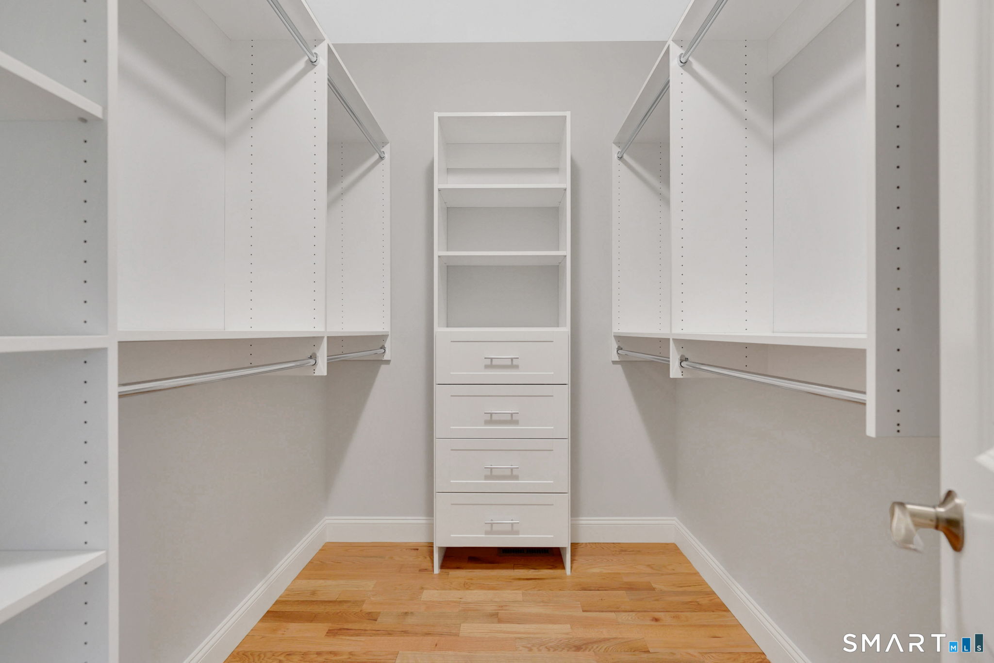 60 Liberty Lane Enfield, CT 06082 - Photo 31 of 38 a view of walk in closet with empty racks