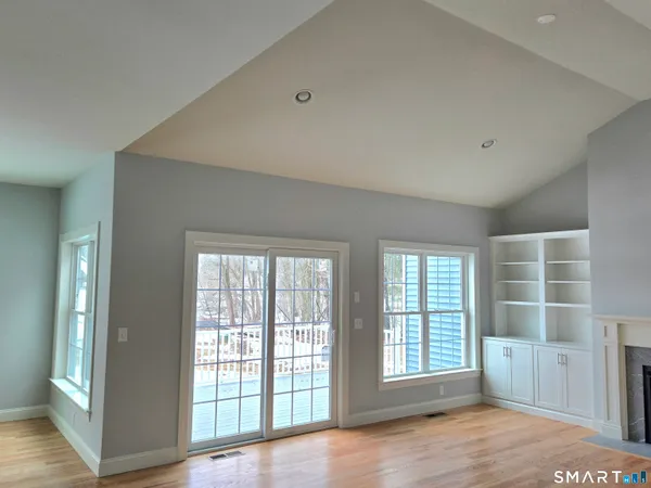 a view of kitchen and wooden floor