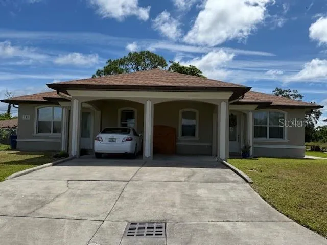 a view of a house with garden