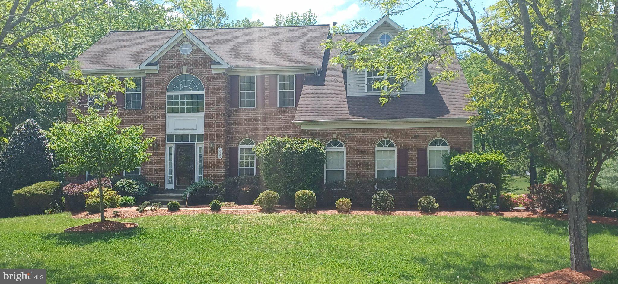 3303 Dunwood Ridge Terrace Bowie, MD 20721 - Photo 75 of 76 Charming brick home in lush greenery.