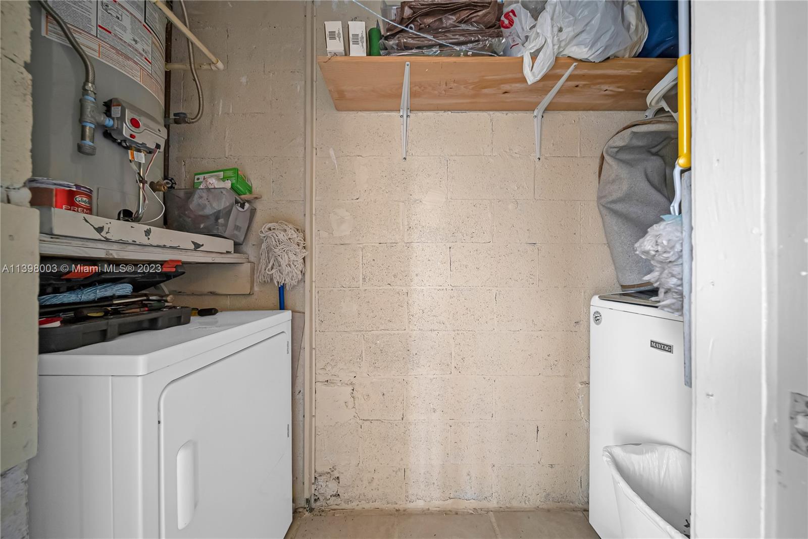 15330 Southwest 106th Terrace, Unit 903 Miami, FL 33196 - Photo 26 of 43 a utility room with dryer and washer