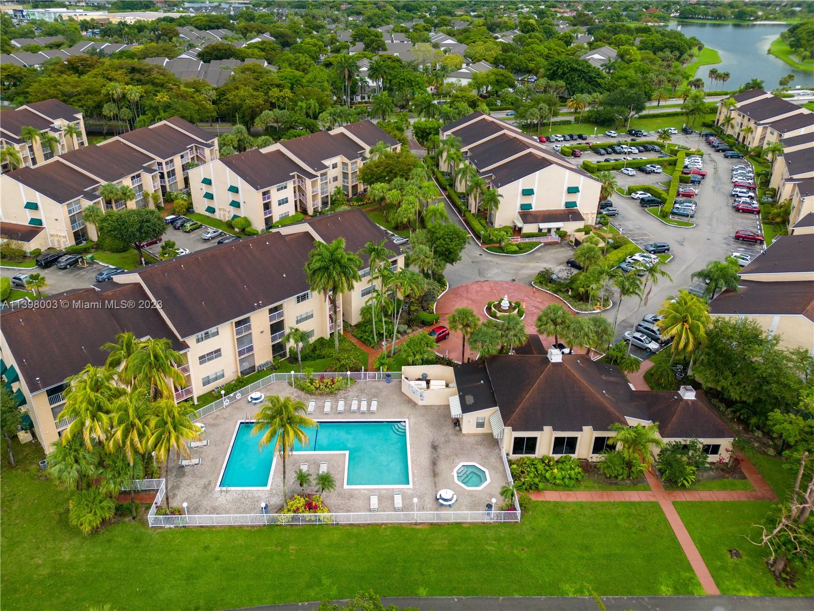 15330 Southwest 106th Terrace, Unit 903 Miami, FL 33196 - Photo 29 of 43 an aerial view of residential houses with outdoor space and parking