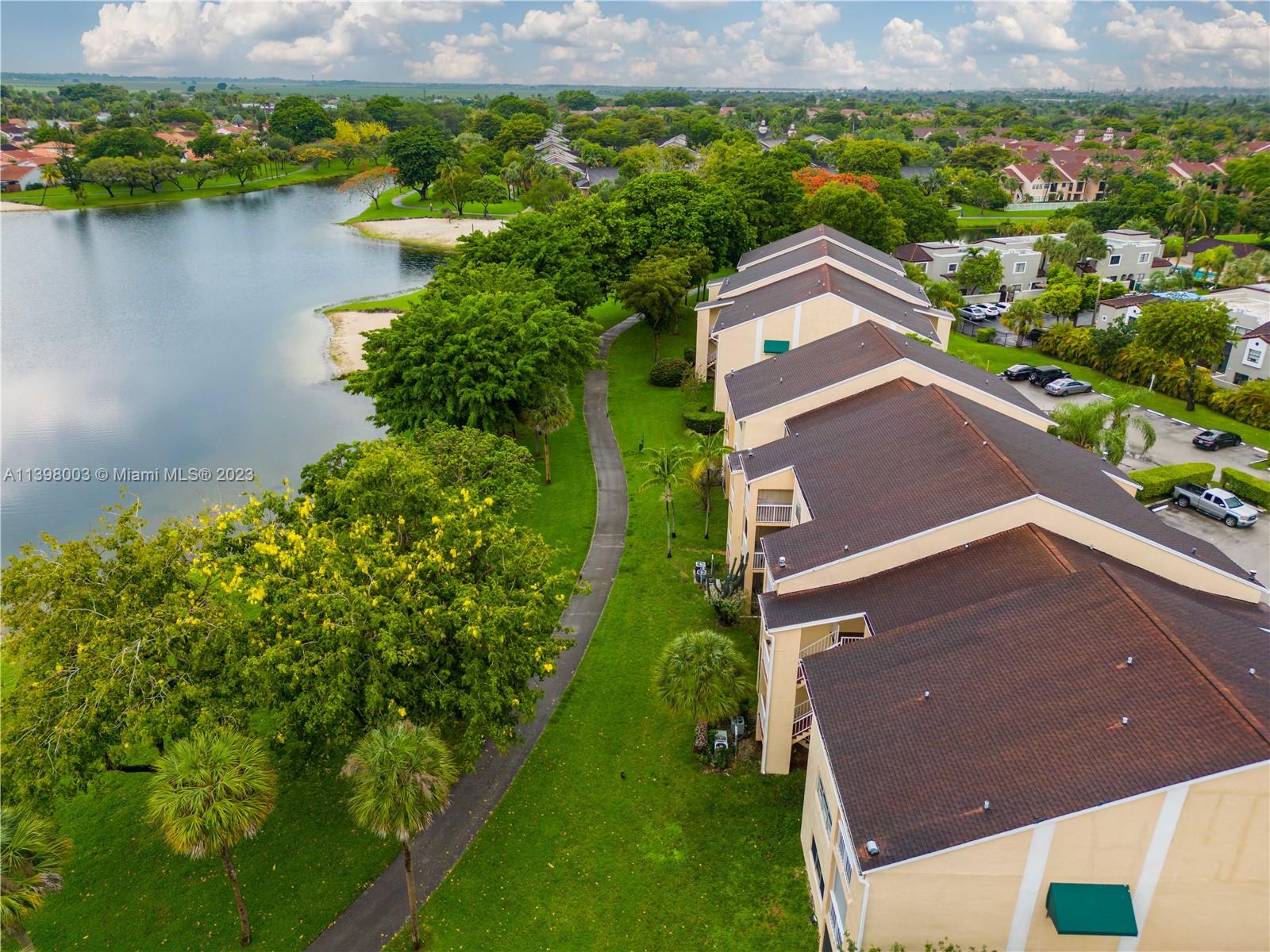 15330 Southwest 106th Terrace, Unit 903 Miami, FL 33196 - Photo 33 of 43 an aerial view of a house with a lake view