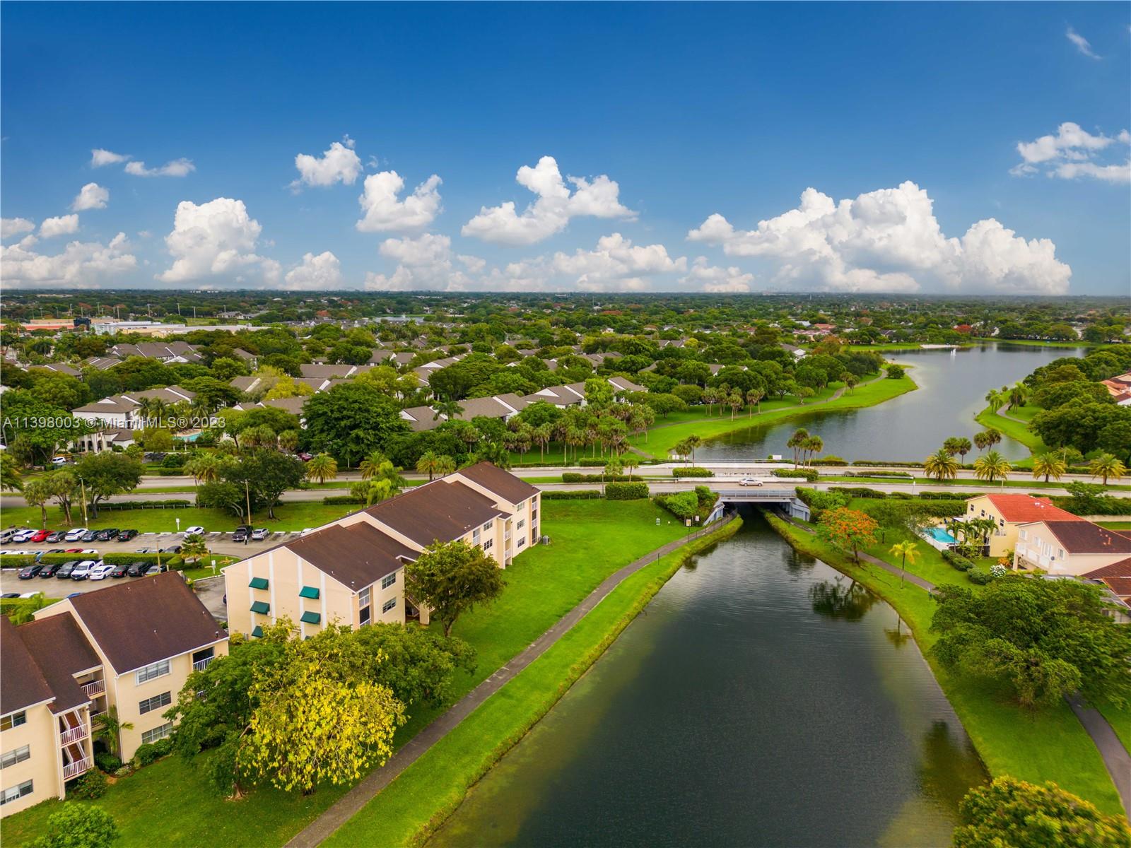15330 Southwest 106th Terrace, Unit 903 Miami, FL 33196 - Photo 36 of 43 an aerial view of a house with a lake view